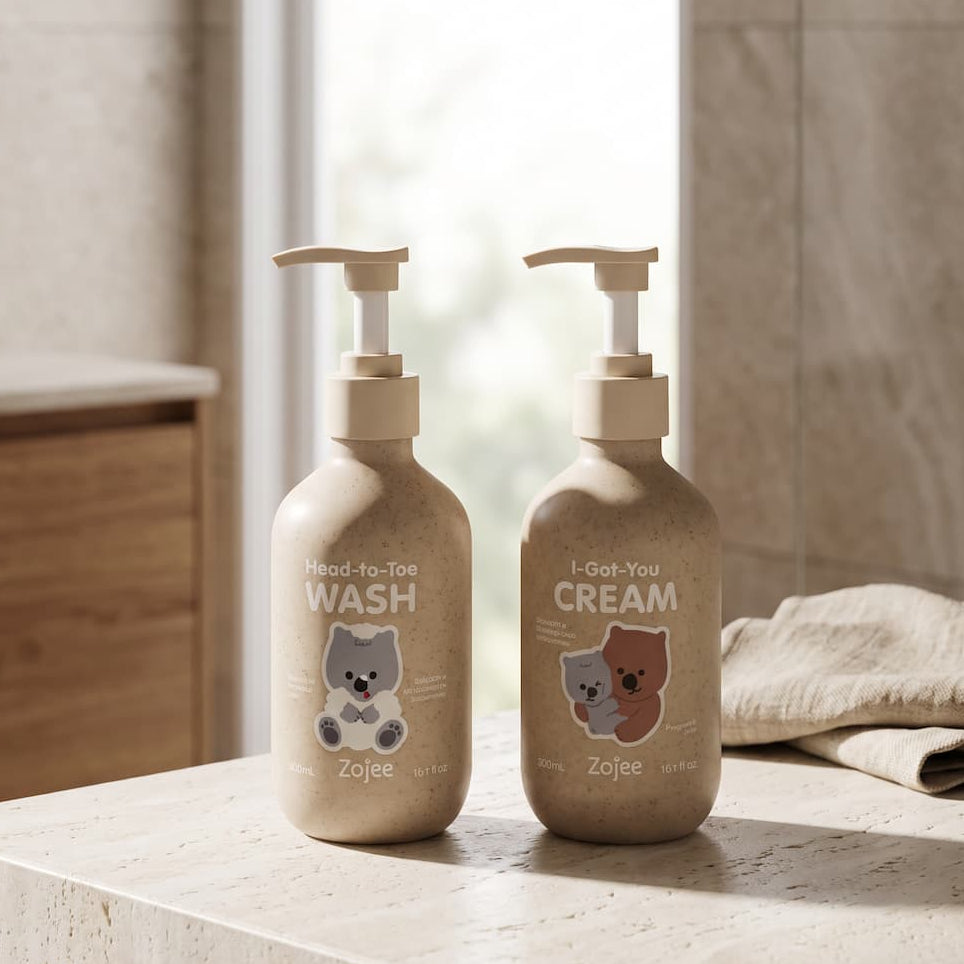 Head-to-Toe Wash and I-Got-You Cream pump bottles on a stone bathroom bench